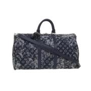 Pre-owned Blått lerret Louis Vuitton Keepall