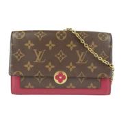 Pre-owned Brunt lerret Louis Vuitton Clutch