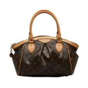 Pre-owned Brunt skinn Louis Vuitton Tivoli