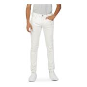 Hvite ensfargede jeans med glidelås og knappelukking