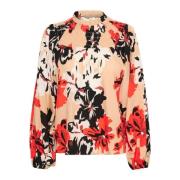 Bluse med smockdetaljer og blomsterprint