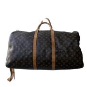 Pre-owned Brunt lerret Louis Vuitton Keepall