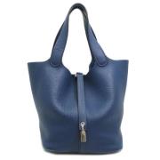 Pre-owned Fabric handbags