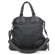 Pre-owned Nylon handbags