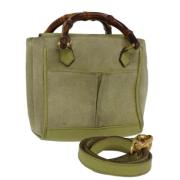 Pre-owned Suede handbags