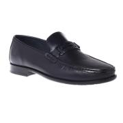 Loafers in dark blue leather