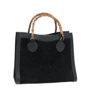 Pre-owned Suede handbags