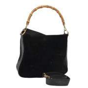 Pre-owned Suede handbags