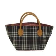 Pre-owned Fabric handbags