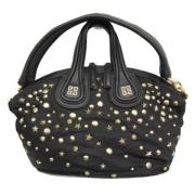 Pre-owned Fabric handbags