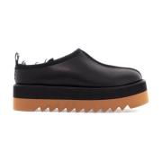 Eco-skinn Flatform Mules med Stoff Trim