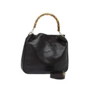 Pre-owned Nylon handbags