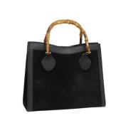 Pre-owned Suede handbags