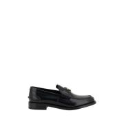 Elegante skinnloafers med ikoniske detaljer