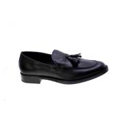 Svarte skinnloafers med dusk